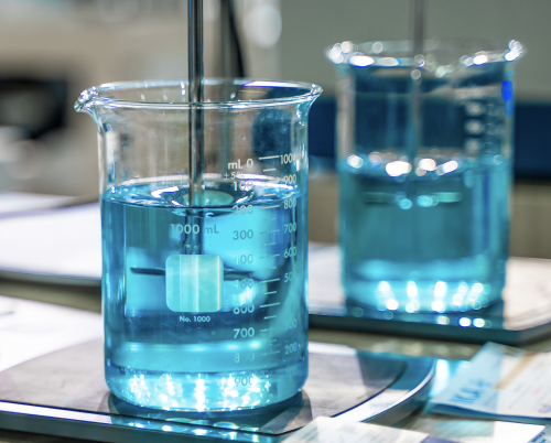 Beaker containing blue chemical